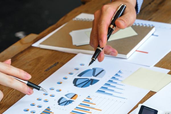 Accountants reviewing financial projections