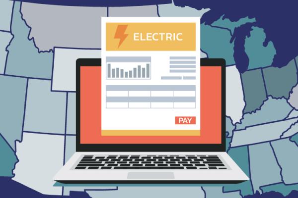Map of the continential united states with a computer and electric bill over it