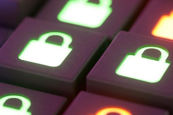 Detail of keyboard with padlock icons lit up in different colors
