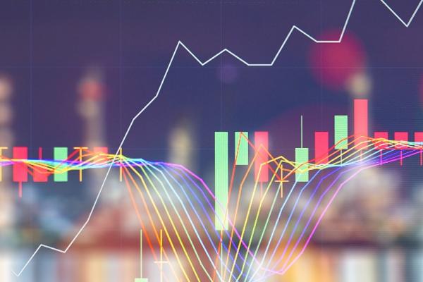 line graphs over blurred city skyline