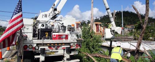 Utility crews repairing storm damage 