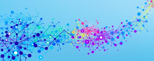 Abstract image of multicolored dots against a blue background