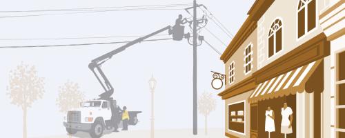 a lineworker repairing a distribution line along a town business corridor