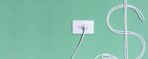electric plug and cord shaped like a dollar sign