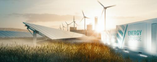 energy storage container, wind turbines and solar panels in a field