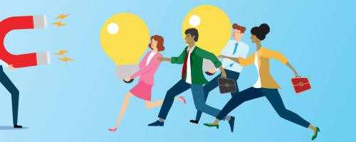 person holding magnet attracting employees with light bulbs