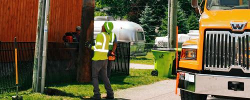 Lineworker with Traverse City Light and Power in Michigan setting a new utility pole